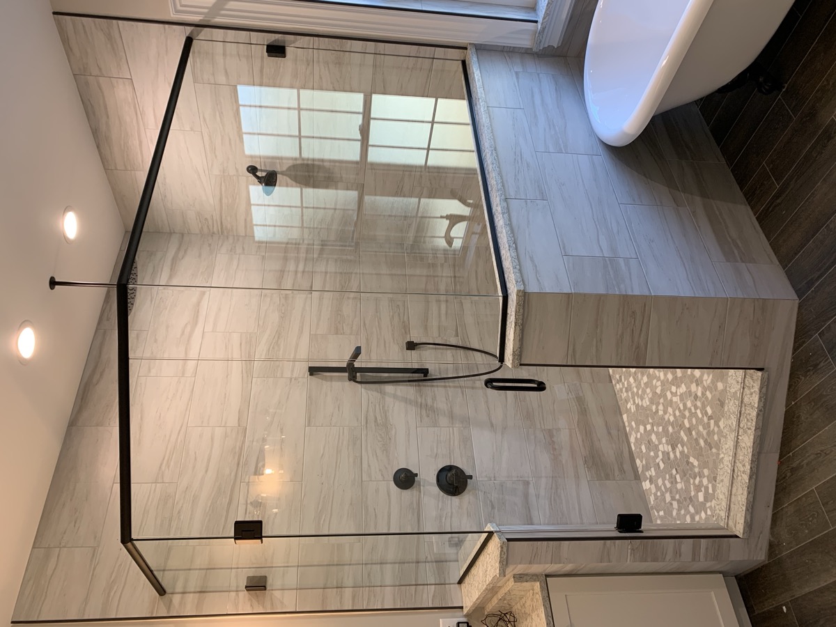 Glass shower door installation photo from Mar 2021