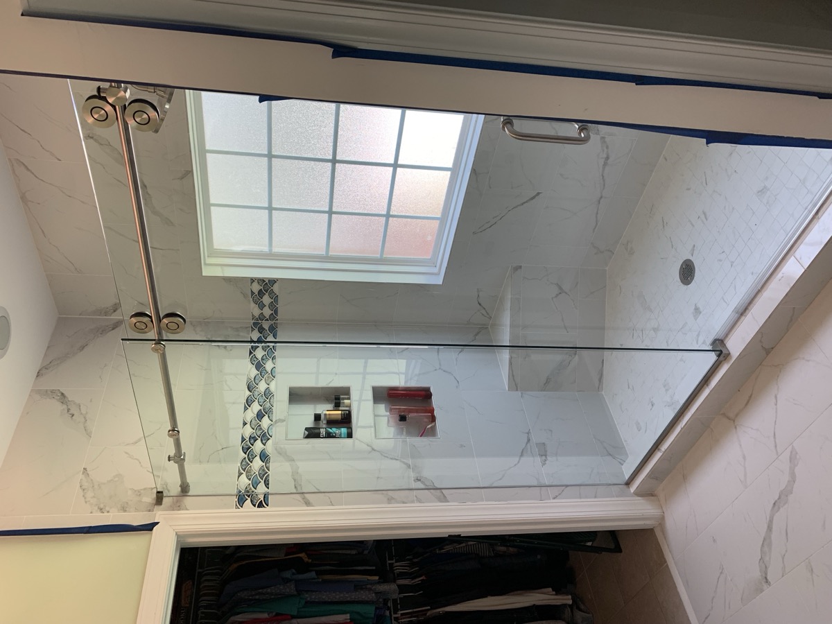 Glass shower door installation photo from Sep 2021