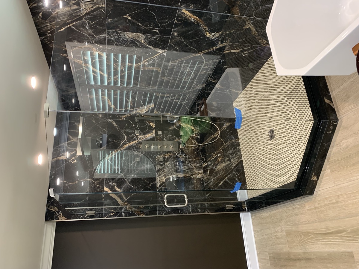Glass shower door installation photo from Apr 2022