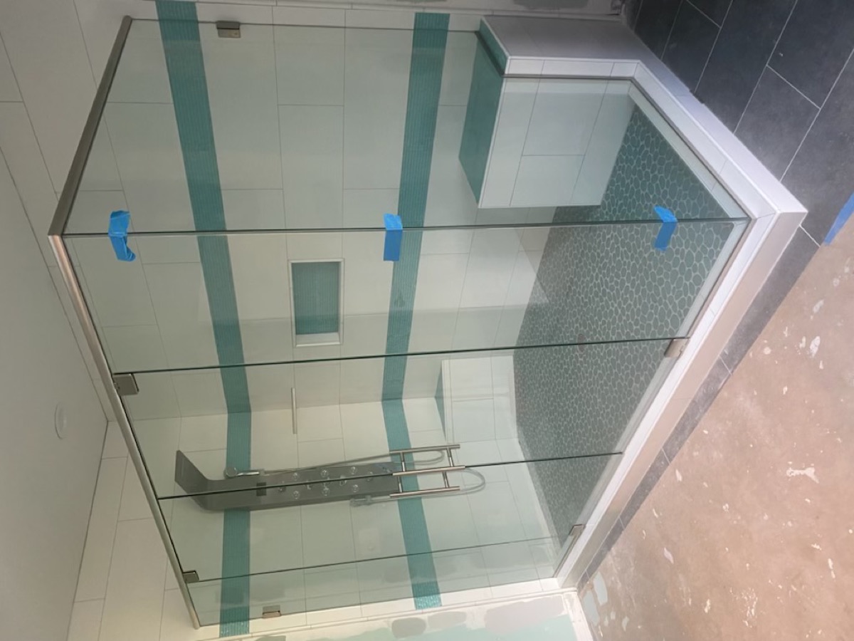 Glass shower door installation photo from Nov 2022