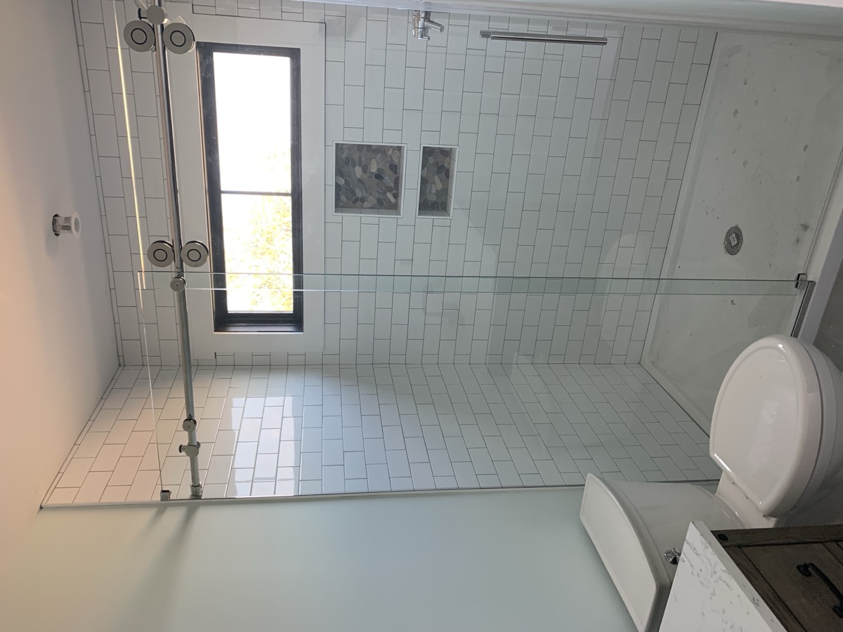 Glass shower door installation photo from Jan 2023
