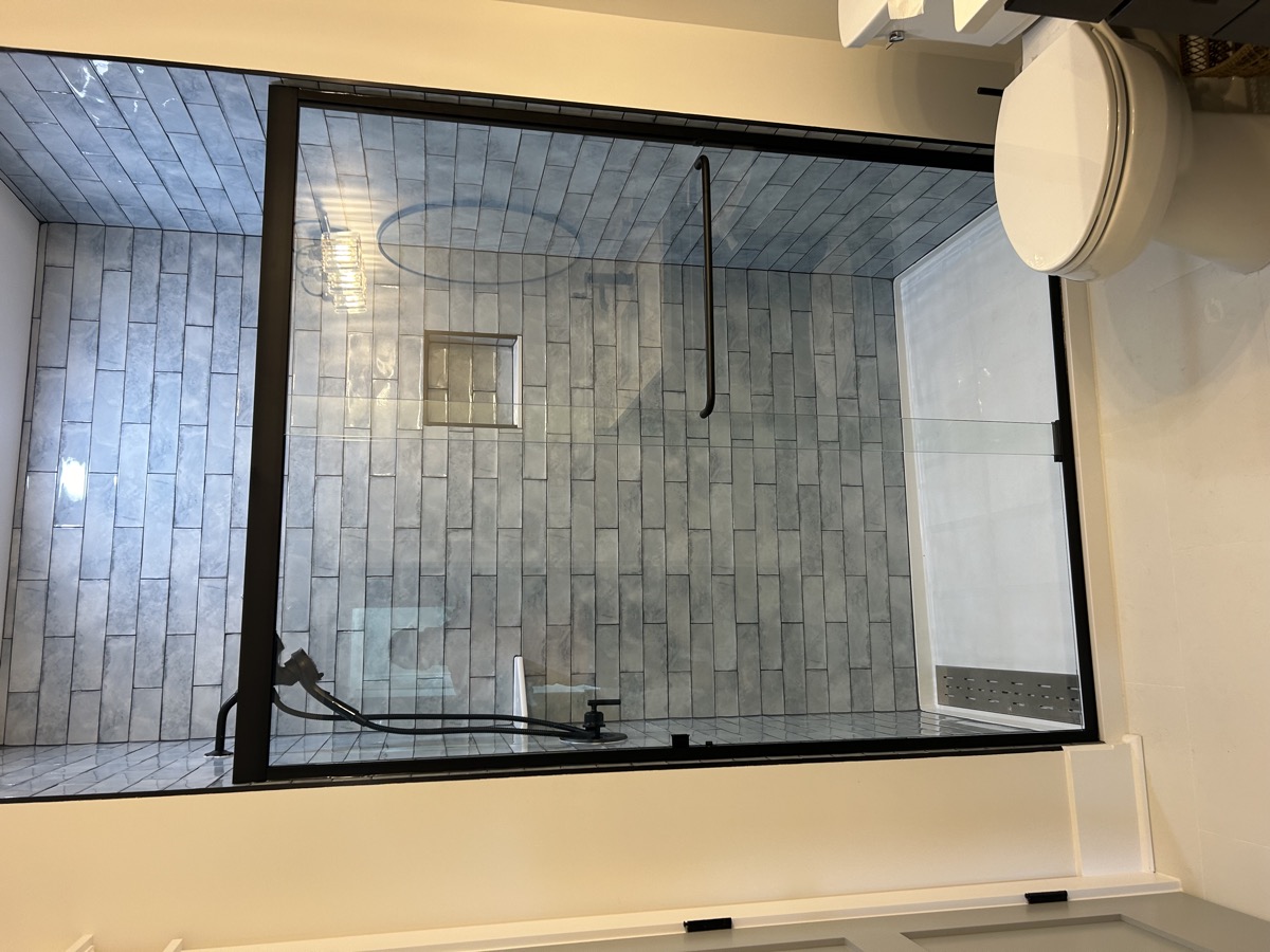 Installed framed shower door