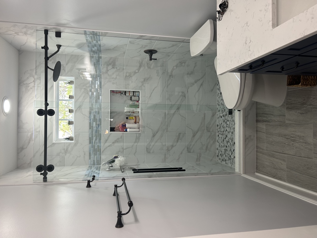 Finished glass shower door