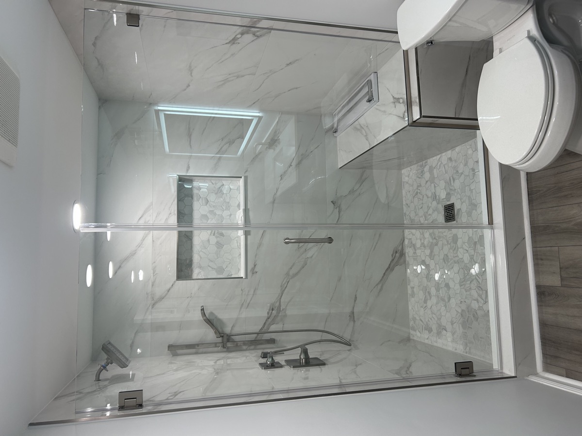 Installed glass shower enclosure